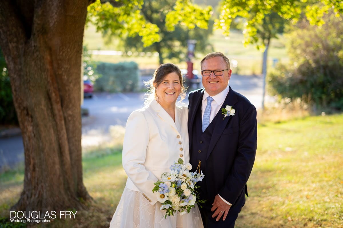 Wedding Photography at The Petersham Hotel in Richmond 1 The bride and groom photographed in the grounds of the Petersham Hotel.
