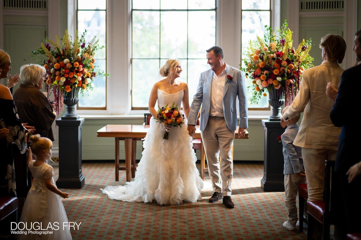 Wedding photograph of couple during ceremony at Trinity House in London